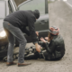 A head-on collision between a car and a cyclist.
