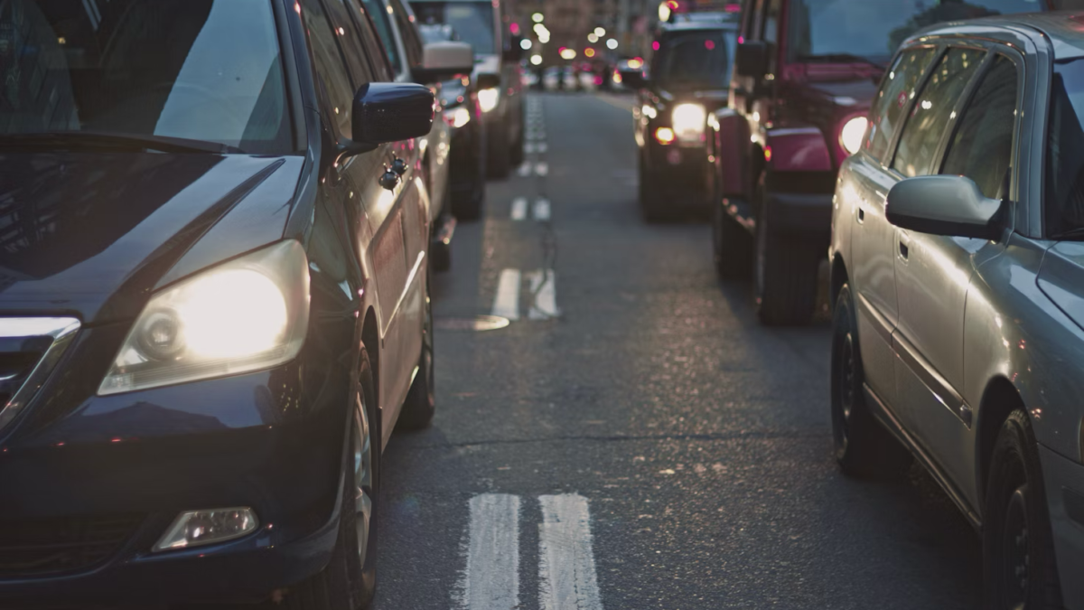 Rows of car headlights and taillights.