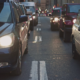 Rows of car headlights and taillights.