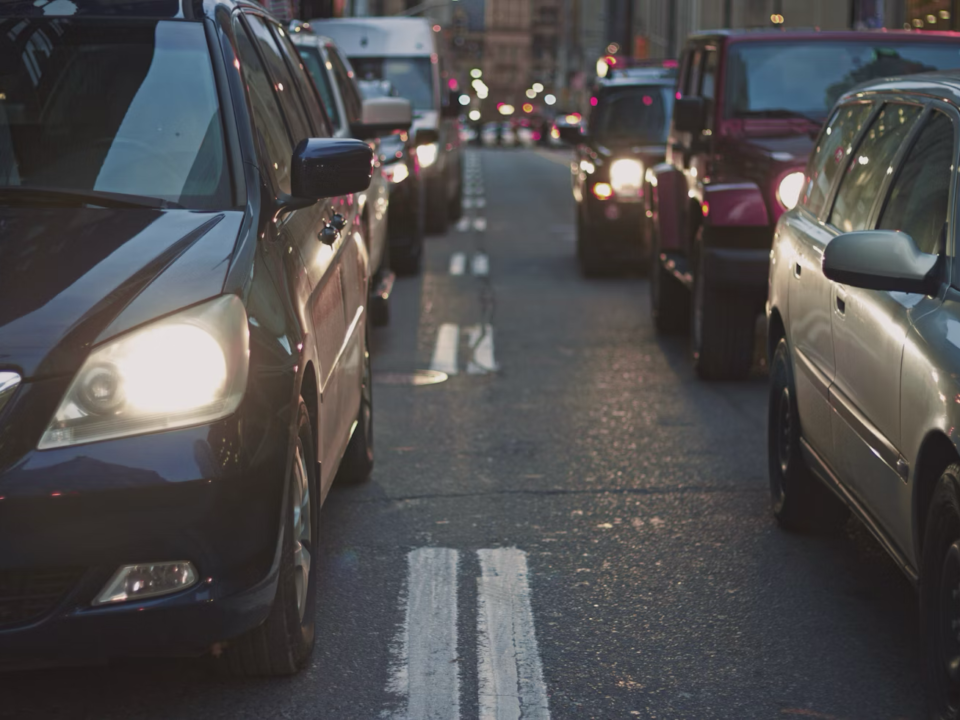 Rows of car headlights and taillights.