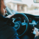 A man using his phone while driving