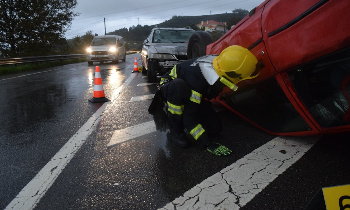Emergency responders at the scene of a highway collision involving multiple vehicles